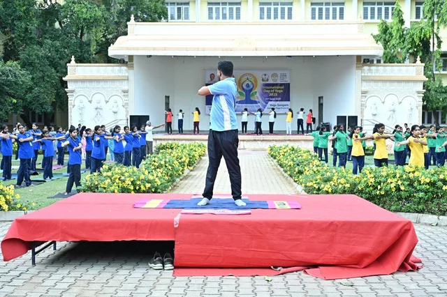 Nikhil leading an outdoor yoga session at SDUAHER