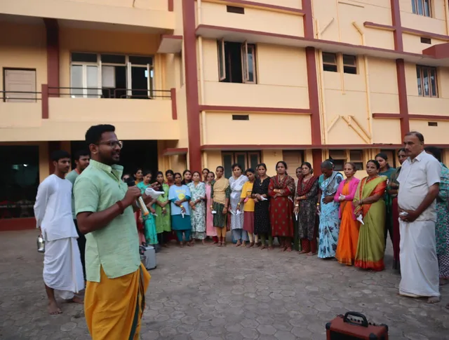 Nikhil speaking to a community group in Honnavara